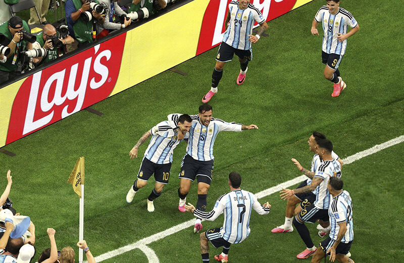 Messi sets new record as Argentina secure place in knockout stage